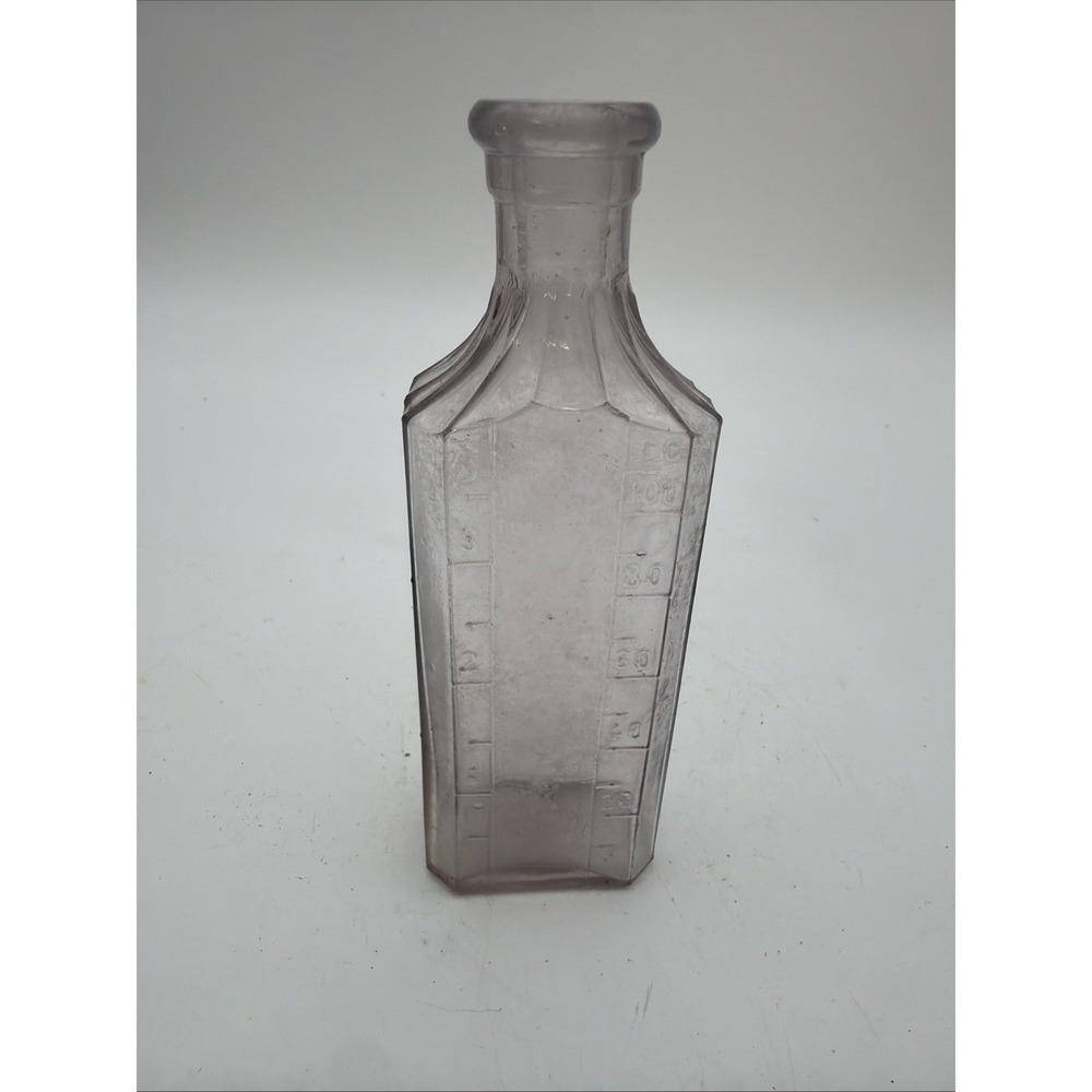 vintage graduated glass medicine bottle Purple